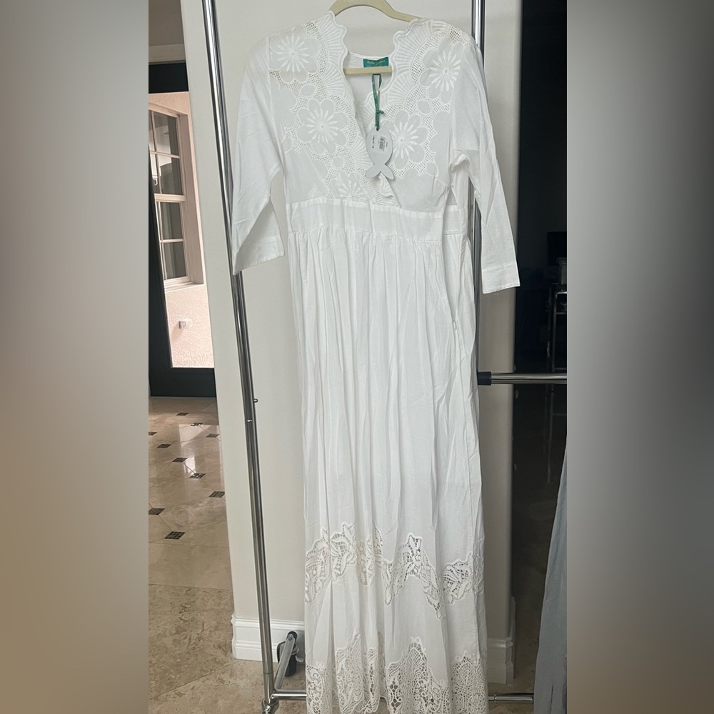 White cotton coverup with lace detail. 3/4 sleeve